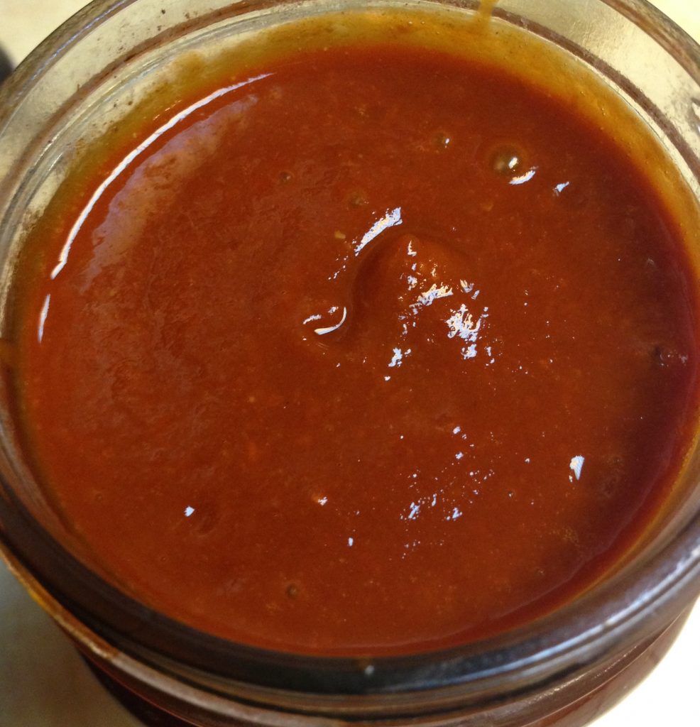 Red chili sauce ready to be poured over enchiladas, tamales, and tofu.