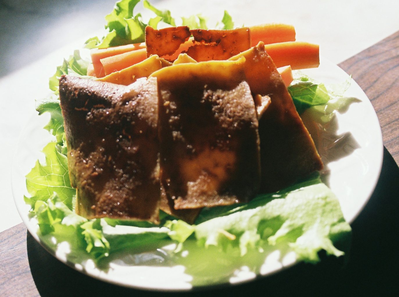 Tofu bacon that can be used for breakfast, as a snack, or crumbled and sprinkled on salads.