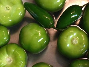 Tomatillos and jalapenos cooking to make tomatillo sauce.