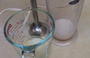 oil and soymilk getting ready to meet with the immersion wand to make some tasty vegan "mayo" spread.