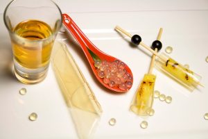 Example of different kinds of molecular gastronomy. Spoon, spheres, drink, and pops.