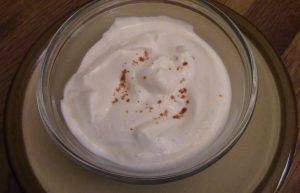A bowl of vegan mayo ready to be folded into potato salad or coleslaw.