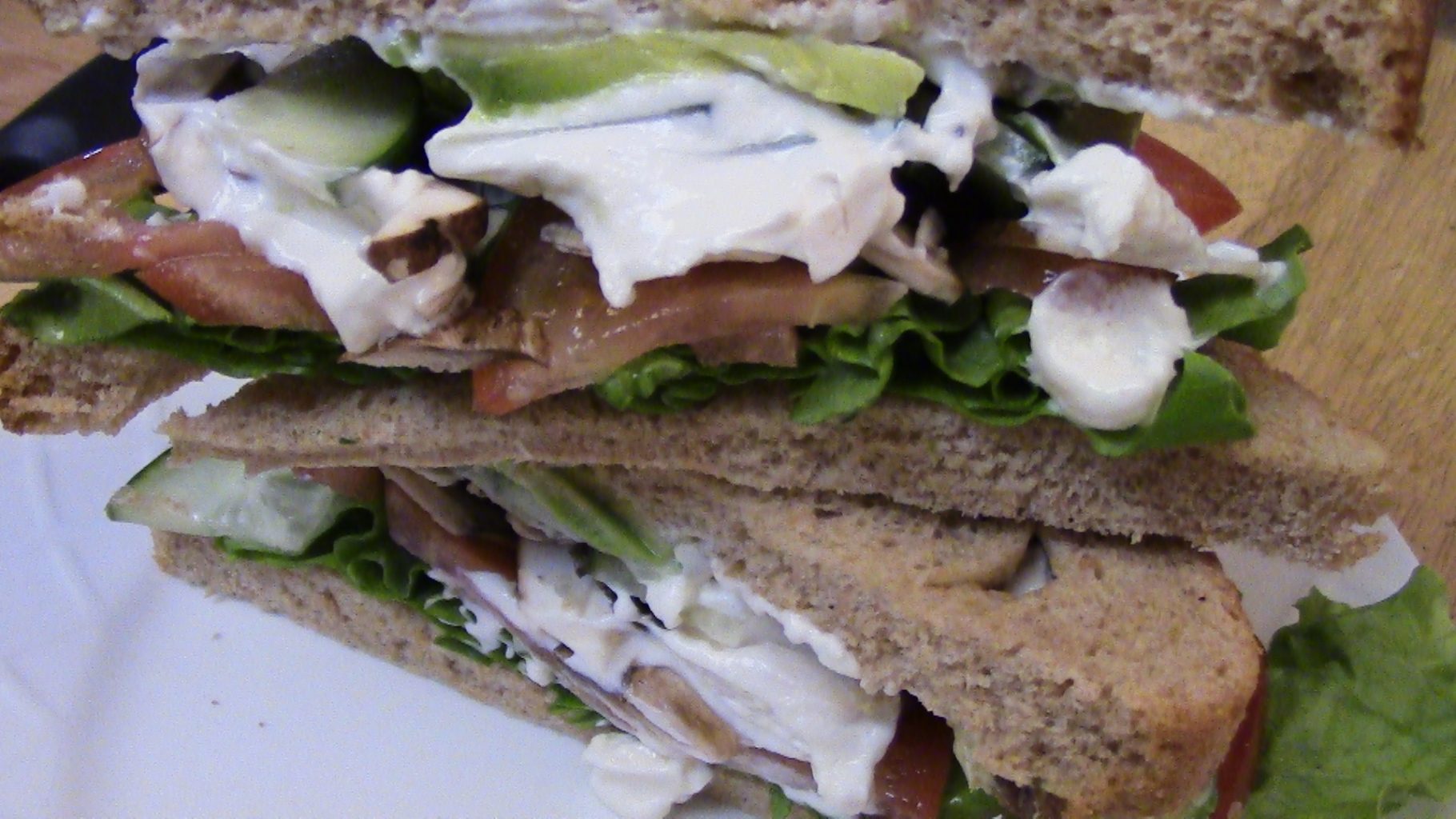 sandwich with vegan mayo slathered on it and ready to eat.